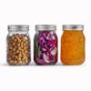 Three EatNeat 16-ounce Pint Glass Canning Jars with Airtight Metal Lids filled with different foods.