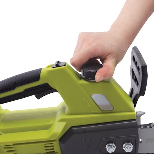 Person twisting off the oil knob on the Sun Joe 24-Volt Cordless 10-inch chainsaw.