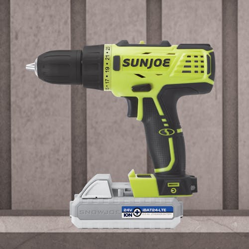 Side view of the Sun Joe 24-Volt Cordless Drill Driver with a 2.0-Ah lithium-ion battery attached.
