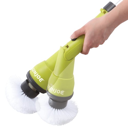 Sun Joe 24-volt Cordless Heavy-Duty Indoor/Outdoor Power Scrubber with motion blur showing the adjustable head.