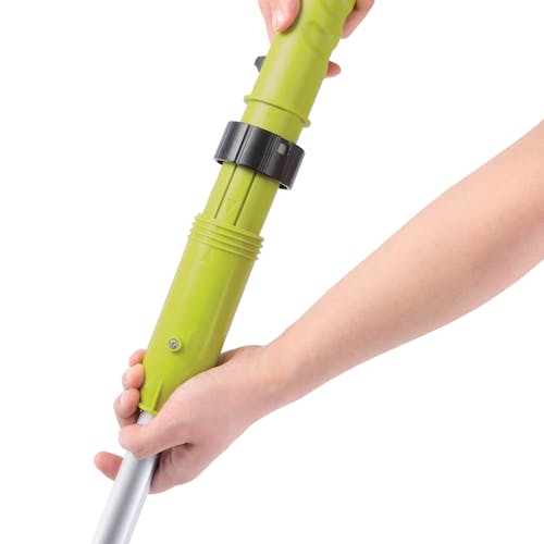 Person adjusting the telescopic pole on the Sun Joe 24-volt Cordless Heavy-Duty Indoor/Outdoor Power Scrubber.
