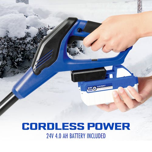 IONMAX battery being inserted into Snow Joe 24V-SS13-TV1 cordless snow shovel