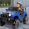 Young girl wearing a helmet and driving the Snow Joe 24-Volt Ride On Kids Truck in a driveway.