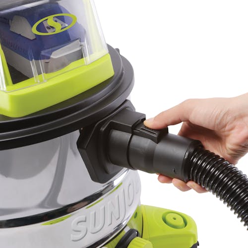 Person attaching the hose for the Sun Joe 24-volt Cordless Portable Stainless Steel Wet/Dry Vacuum Kit.