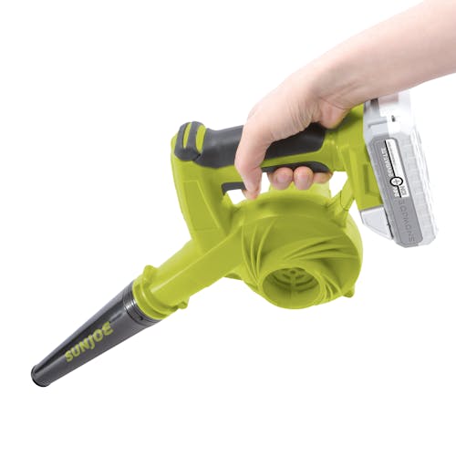 Person holding the Sun Joe 24-volt cordless workshop blower with a 2.0-Ah lithium-ion battery attached.