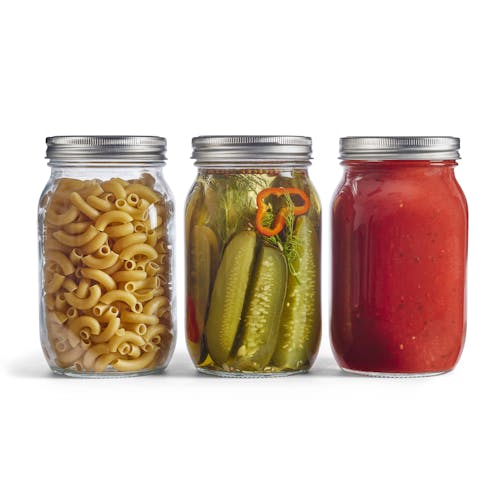 Three EatNeat 32-ounce quart wide mouth glass canning jars with airtight metal lids filled with different foods.