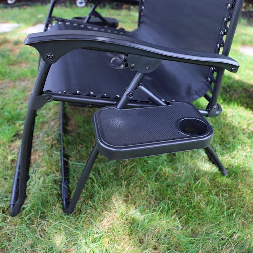 Close-up of the tray on the 45-inch 2-Person Black Gravity Free Recliner.
