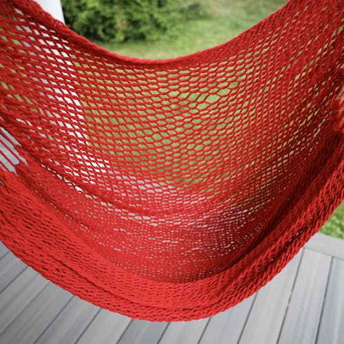 Close-up of the seating area on the Bliss Hammocks 40-inch Red Island Rope Hammock Chair.