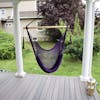 Bliss Hammocks 40-inch Purple Island Rope Hammock Chair hanging on a front porch.