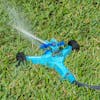 Aqua Joe 10-inch wheeled base Indestructible Zinc Impulse 360 Degree Sprinkler watering a lawn.