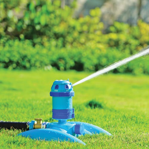 Turbo Drive 360° Sprinkler watering a lawn using the full spray pattern.