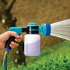 Aqua Joe 17-ounce Hose-Powered Multi Spray Gun with Quick Change Soap to Water Dial being sprayed.