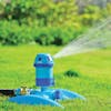 Aqua Joe 6-Pattern Turbo Drive 360 Degree Sprinkler watering a lawn.