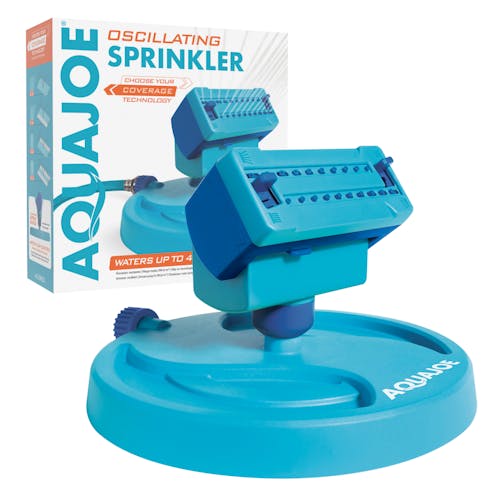 Aqua Joe 20-Nozzle Mini Oscillating Sprinkler on Sled Base with packaging behind it.