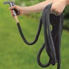 Aqua Joe 100-foot black garden Hose being used with a hose nozzle.