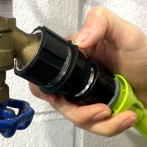 Aqua Joe No-Splash Aluminum Quick Connect Adapter being attached to a garden hose.
