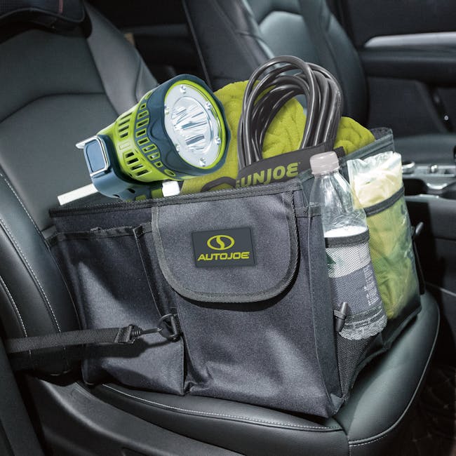 Auto Joe Collapsible Auto Storage Organizer sitting in a car seat filled with a flashlight, power cord, water bottle, and more.