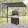 Bliss Outdoors Barbeque Gazebo stood over a grill with condiments and food on the serving shelf.