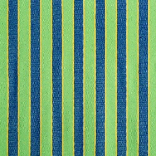 Close-up of the fabric and pattern showing the green and blue stripes with yellow lines.
