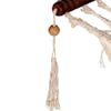 Close-up of the tassel hanging from the ends of the spreader bars.