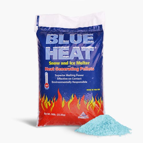 Blue Heat 50 pound bag of Calcium Blend Ice and Snow Melt with a pile of the melt in front of the bag.