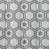 Close-up of the fabric and pattern, showing the grey color with a dark grey hexagon pattern.