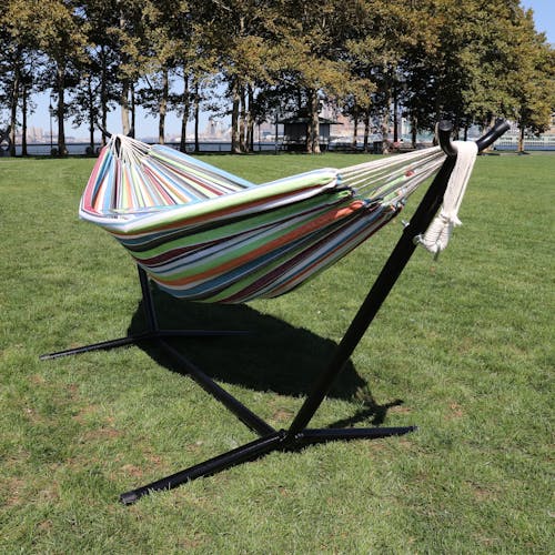 60-inch hammock and stand on grass in a park.