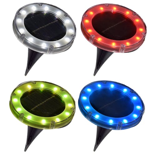 4-pack of solar LED plastic disc lights, lit up different colors.