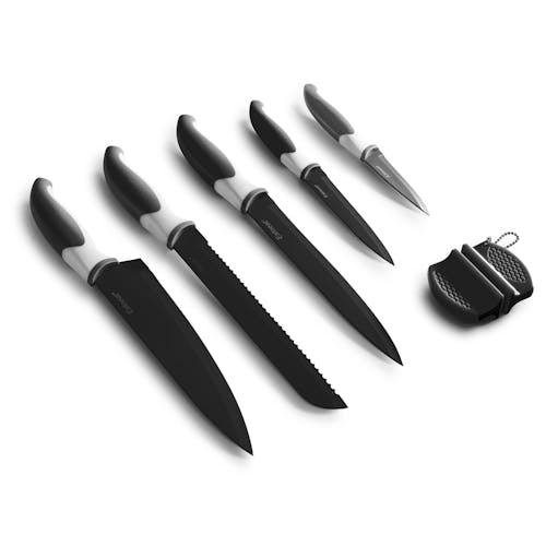 5 black kitchen knives and a knife sharpener.
