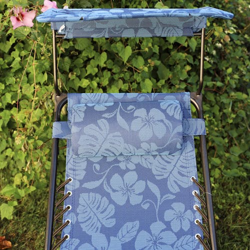Close-up of the pillow and canopy on the 26-inch Blue Flower Zero Gravity Chair.