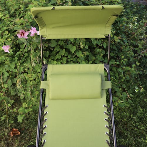 Close-up of the headrest and canopy on the 26-inch Sage Green Zero Gravity Chair.