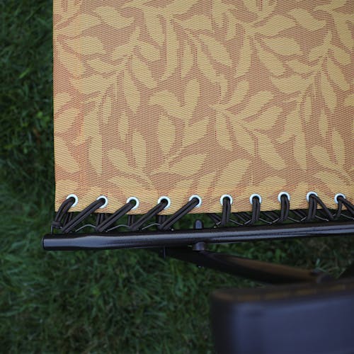 Close-up of the bungees on the 26-inch Amber Leaf Reclining Sling Chair.