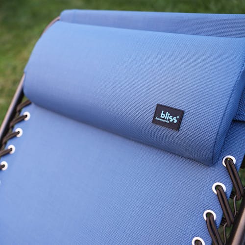 Close-up of the headrest pillow and Bliss Hammocks logo on the 26-inch Denim Blue Reclining Sling Chair.