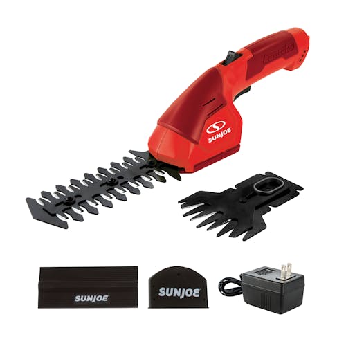 Sun Joe 2-in-1 Cordless red-colored Grass Shear and Hedger with 2 blade attachments, blade covers, and charger.
