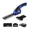 Sun Joe 2-in-1 Cordless blue-colored Grass Shear and Hedger with 2 blade attachments, blade covers, and charger.