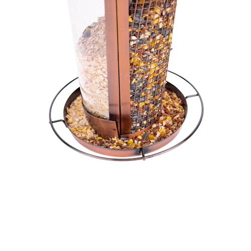 Close-up of the base and circular perch bar on the Bliss Outdoors 2-in-1 Hanging Bird Feeder.