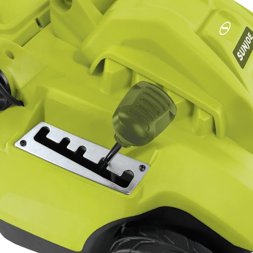 Close-up of the height adjustment lever on the Sun Joe 6.5-amp 16-inch Electric Reel Lawn Mower with grass catcher.