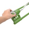Person adjusting the range on the Martha Stewart 18-nozzle Oscillating Sprinkler.
