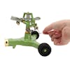 Person adjusting the spray pattern on the Martha Stewart Metal Impulse Sprinkler.