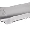 Close-up of the serrations on the blade of the Nisaku Hori Hori 5-inch Mini Stainless Steel Knife.
