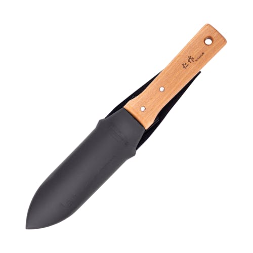 Nisaku Hori-Hori Namibagata 7.25-inch Japanese Stainless Steel Weeding Knife inside the blade sheath.