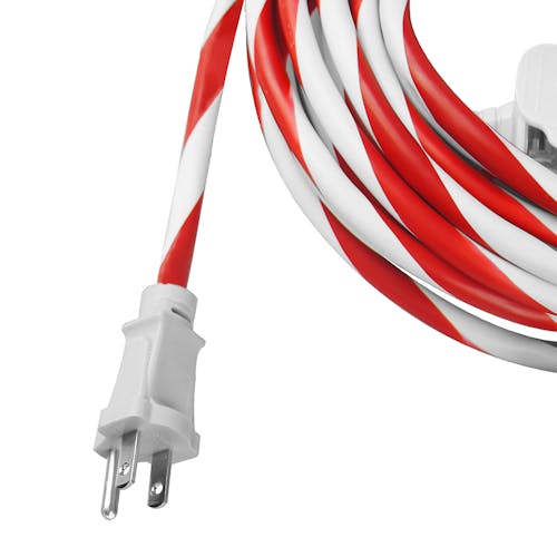 Close-up of the plug on the Snow Joe and Sun Joe 25-foot indoor and outdoor extension cord in the candy cane variation.