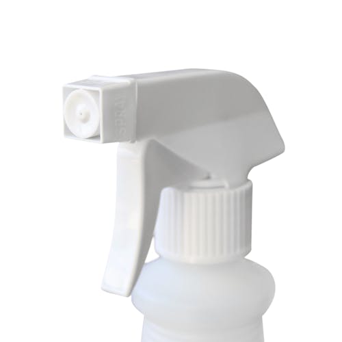 Close-up of the squeeze-trigger nozzle on the spray bottle.