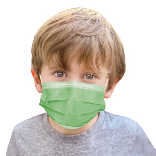 Young boy wearing a green disposable face mask.