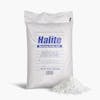 Halite 50 pound rock salt snow and ice melter with a pile of the salt in front of the bag.