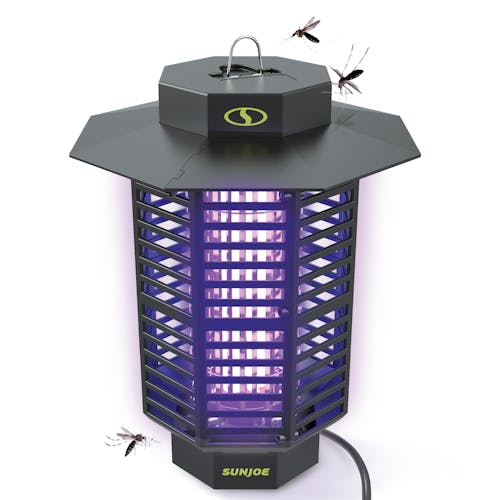 Sun Joe 18-Watt UV Indoor and Outdoor Bug Zapper turned on with insects around it.