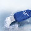 Snow Joe waterproof Polar Fleece Lined Mitt with Built-In Heavy-Duty Ice Scrapper scraping ice off a window.