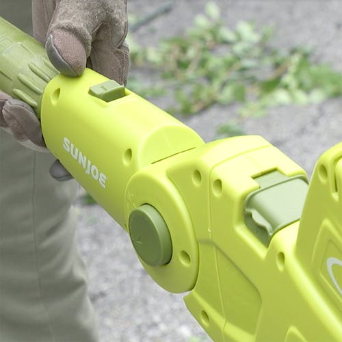 Close-up of the adjustable head on the Sun Joe 4-amp 21-inch Electric Telescoping Pole Hedge Trimmer.