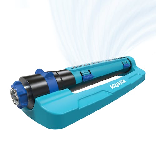 Aqua Joe 20-nozzle Turbo Oscillating Lawn Sprinkler spraying water.