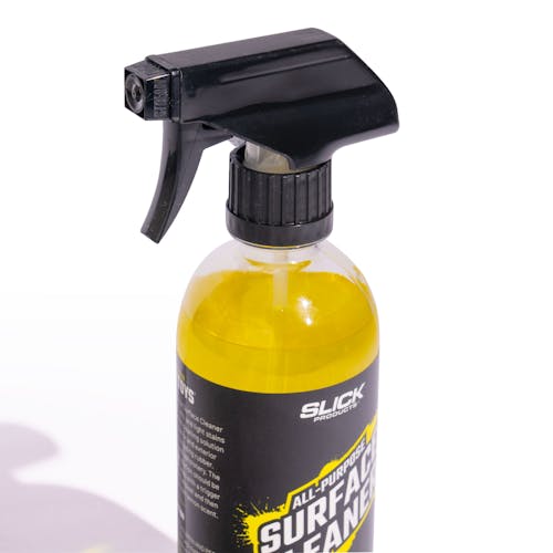 squirt nozzle for slick cleaner